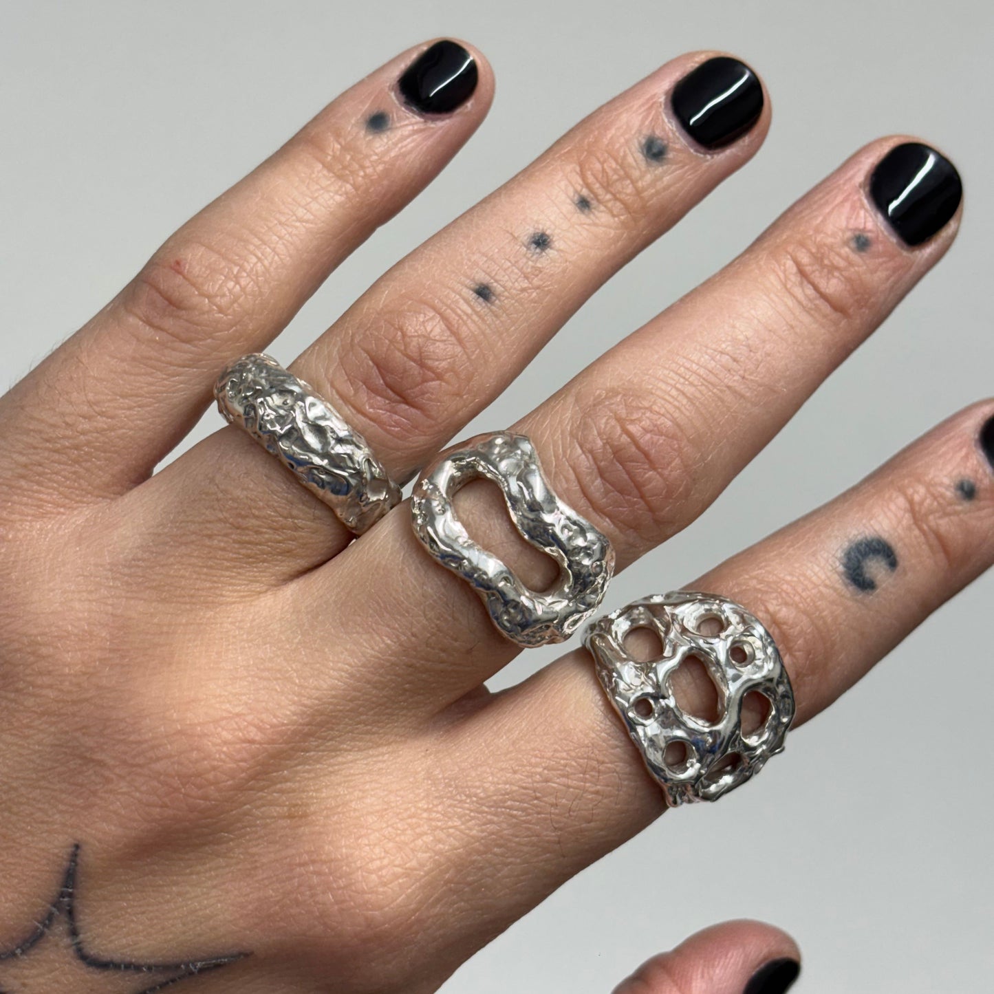 SILVER RING WITH HOLES