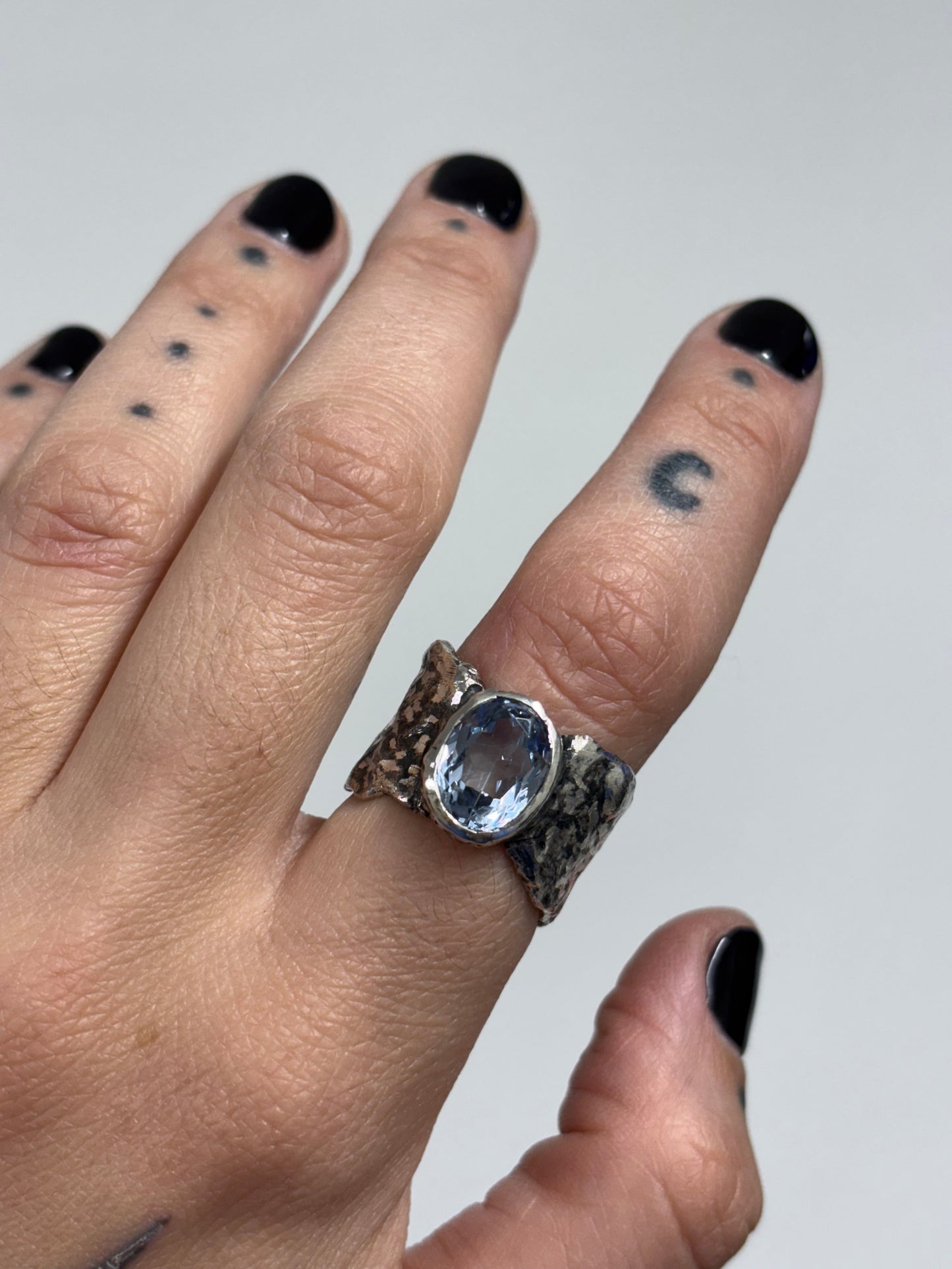 SILVER AND TOPAZ RING