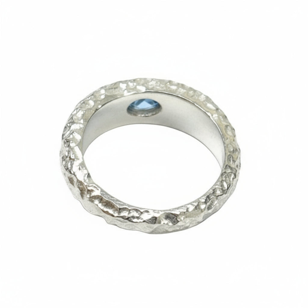 SILVER RING WITH TEXTURE AND BLUE TOPAZ