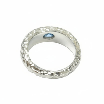 SILVER RING WITH TEXTURE AND BLUE TOPAZ